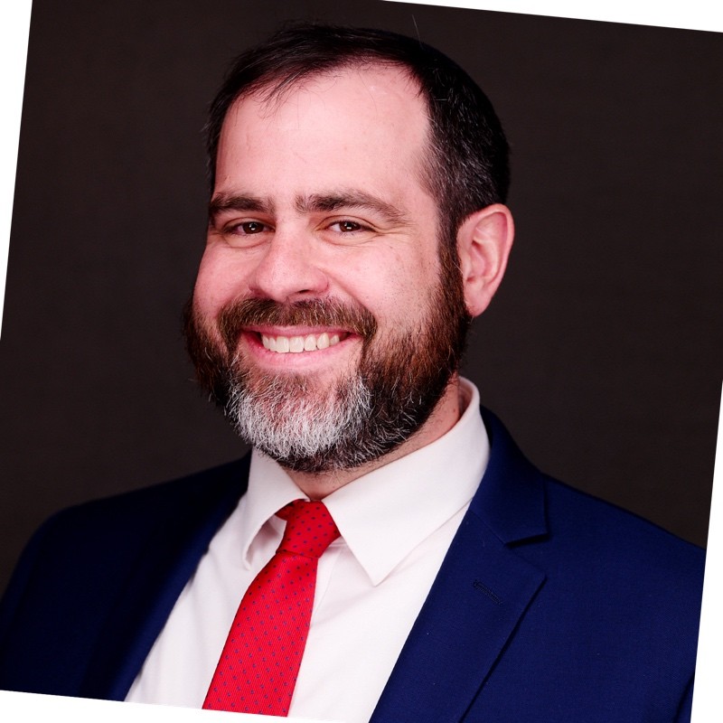 Josh Gottesman, Chief Human Resources Officer at Orthodox Union seen with a bright smile on his face